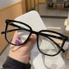 "Blue Light Protection Glasses with Black Frame - Large Transparent Square Lenses, Fashionable and Suitable for Computer Use."